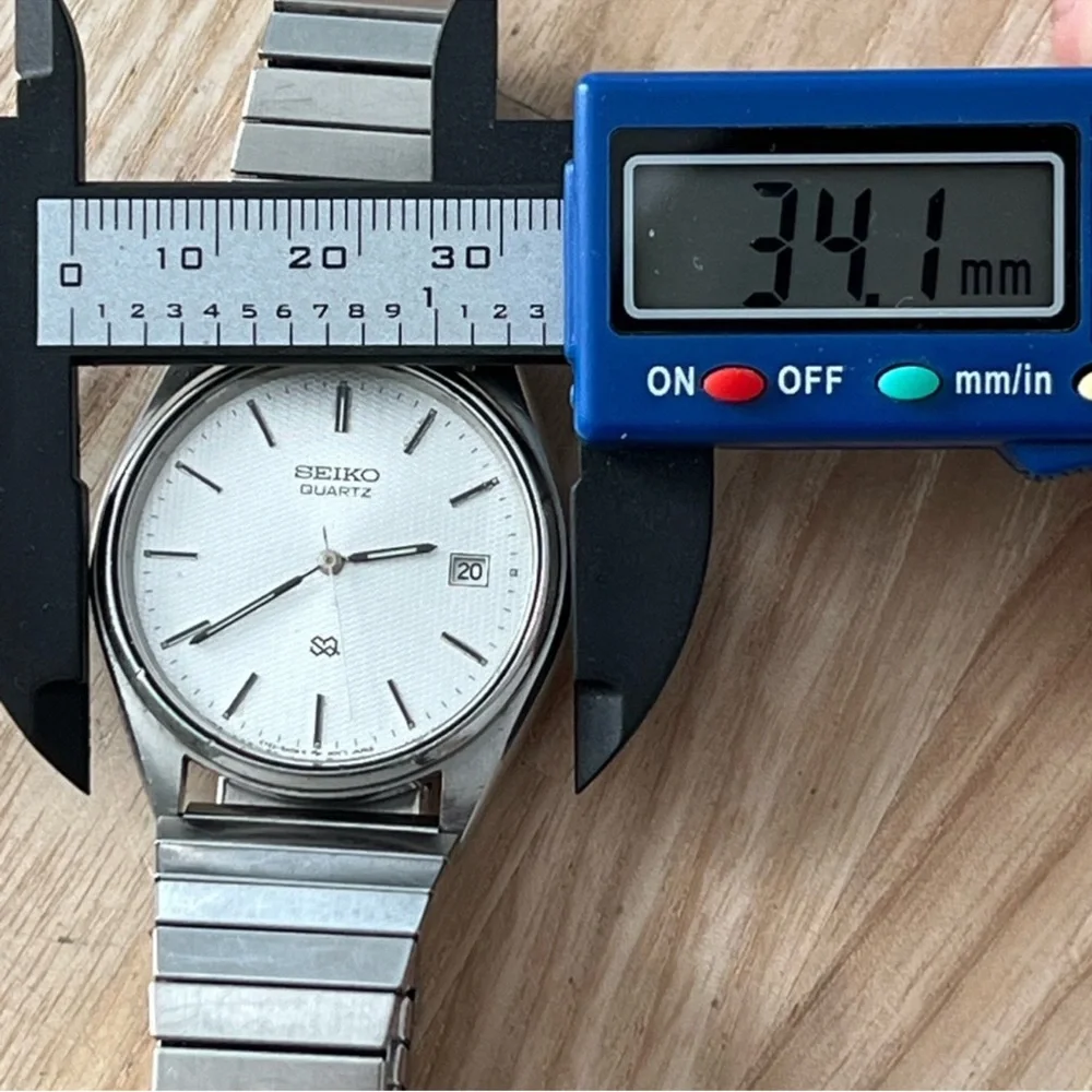 Seiko SQ Men's Watch Vintage Stainless Dial Stretch Bracelet Date Windows